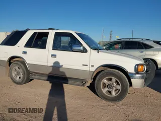1996 Isuzu Rodeo z VIN 4S2CM58V9T4331093, wystawiony jako IAAI lot #41062073 z przebiegiem 161 833 mil mil oraz . Historia ofert i sprzedaży dostępna na DreamBid. Obrazek 6.