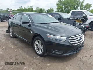 2015 Ford Taurus SEL with VIN 1FAHP2E80FG192017, listed as a IAAI auction lot 42562853 with 124,348 mi miles and . Bid and sale history available at DreamBid. Image 1.