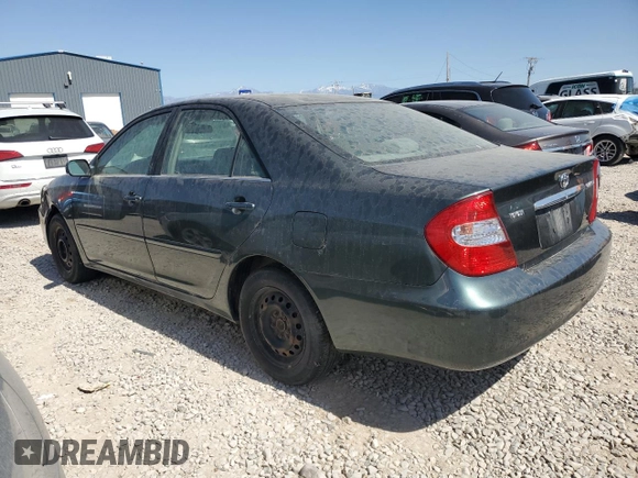 2002 Toyota Camry LE z VIN JTDBE32K120068644, wystawiony jako Copart lot #61168915 z przebiegiem 210 149 mil mil oraz Czysty tytuł • Clean title. Historia ofert i sprzedaży dostępna na DreamBid. Obrazek 2.