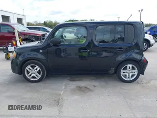 2009 Nissan Cube SL z VIN JN8AZ28R59T103584, wystawiony jako IAAI lot #41685022 z przebiegiem 158 810 mil mil oraz . Historia ofert i sprzedaży dostępna na DreamBid. Obrazek 13.