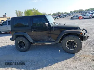 2008 Jeep Wrangler X with VIN 1J4FA24118L646979, listed as a IAAI auction lot 41981709 with 142,081 mi miles and . Bid and sale history available at DreamBid. Image 13.