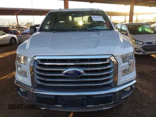 2015 Ford F-150 XLT z VIN 1FTEX1E87FFD13249, wystawiony jako IAAI lot #41214373 z przebiegiem 66 076 mil mil oraz . Historia ofert i sprzedaży dostępna na DreamBid. Obrazek 12.