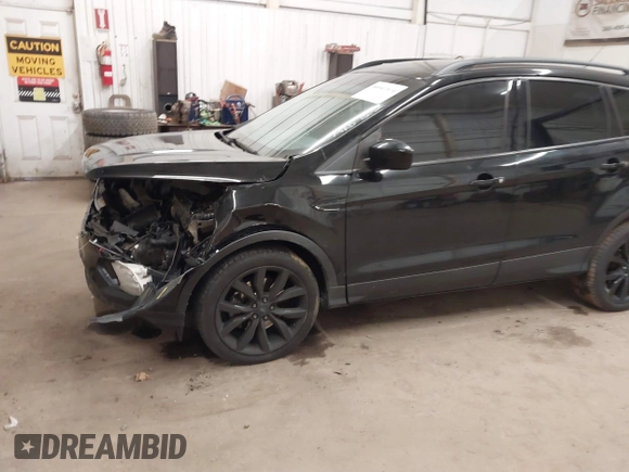2017 Ford Escape SE with VIN 1FMCU9G98HUE31244, listed as a IAAI auction lot 40985971 with 88,067 mi miles. Bid and sale history available at carsss.com. Image 6.