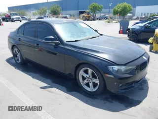 2013 BMW 3 Series 328i with VIN WBA3A5C52DF352107, listed as a IAAI auction lot 42169521 with 125,141 mi miles. Bid and sale history available at carsss.com. Image 1.
