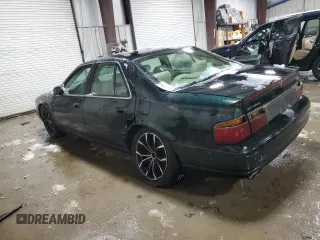 2000 Cadillac Seville Touring STS z VIN 1G6KY5494YU220613, wystawiony jako Copart lot #87338724 z przebiegiem 106 313 mil mil oraz Szkoda całkowita • Salvage title. Historia ofert i sprzedaży dostępna na DreamBid. Obrazek 2.
