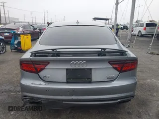 2016 Audi A7 3.0 Premium Plus with VIN WAUWGAFC0GN003357, listed as a IAAI auction lot 41468854 with 62,590 mi miles. Bid and sale history available at carsss.com. Image 16.
