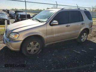 2005 Mercedes-Benz M 500 with VIN 4JGAB75E85A529110, listed as a Copart auction lot 80557034 with 130,560 mi miles and Salvage Title. Bid and sale history available at DreamBid. Image 1.