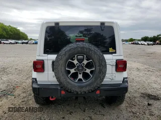 2018 Jeep Wrangler Unlimited Rubicon with VIN 1C4HJXFG2JW244664, listed as a Copart auction lot 52987455 with 40,463 mi miles and Salvage title. Bid and sale history available at DreamBid. Image 6.