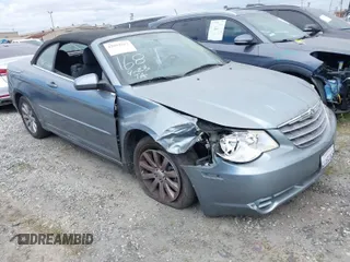 2010 Chrysler Sebring Touring with VIN 1C3BC5ED5AN187589, listed as a IAAI auction lot 42014513 with 114,044 mi miles. Bid and sale history available at carsss.com. Image 1.