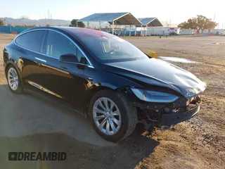 2019 Tesla Model X 75D with VIN 5YJXCAE29KF186356, listed as a IAAI auction lot 41829702 with 56,765 mi miles. Bid and sale history available at carsss.com. Image 1.