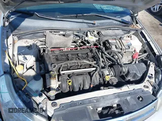 2008 Ford Focus SE with VIN 1FAHP35N48W243314, listed as a IAAI auction lot 42001321 with 210,639 mi miles. Bid and sale history available at carsss.com. Image 10.