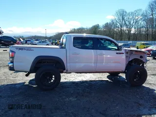 2020 Toyota Tacoma SR5 with VIN 3TMAZ5CN4LM132002, listed as a IAAI auction lot 41224844 with 55,000 mi miles and . Bid and sale history available at DreamBid. Image 14.