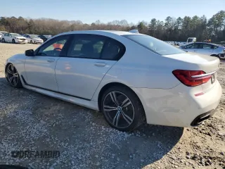 2016 BMW 7 Series 750i with VIN WBA7F0C56GGL99161, listed as a Copart auction lot 87652655 with 97,805 mi miles and Salvage Title. Bid and sale history available at carsss.com. Image 2.