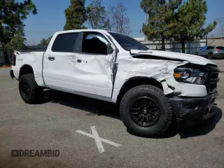 2023 Ram 1500 Tradesman with VIN 1C6SRFGT7PN684311, listed as a Copart auction lot 69792804 with 13,946 mi miles and Salvage title. Bid and sale history available at DreamBid. Image 4.