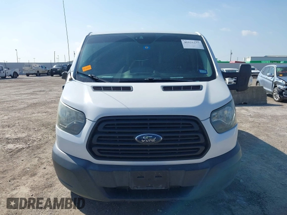2016 Ford Transit Cargo z VIN 1FTYR1YMXGKB54607, wystawiony jako IAAI lot #41521237 z przebiegiem 195 851 mil mil oraz . Historia ofert i sprzedaży dostępna na DreamBid. Obrazek 12.