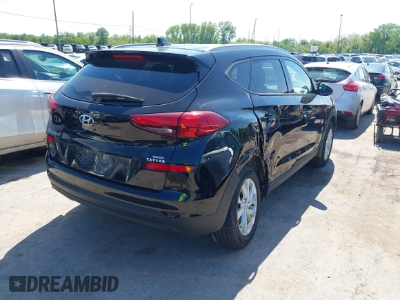 2019 Hyundai Tucson Value with VIN KM8J3CA46KU935335, listed as a IAAI auction lot 42296162 with 65,099 mi miles and . Bid and sale history available at DreamBid. Image 4.