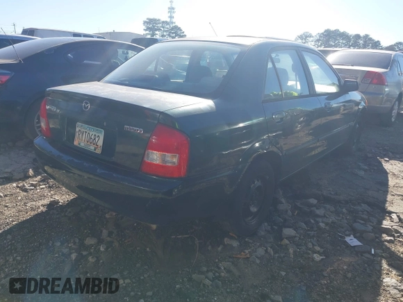 2000 Mazda Protege DX with VIN JM1BJ2229Y0235881, listed as a IAAI auction lot 41484779 with 283,054 mi miles and . Bid and sale history available at DreamBid. Image 4.