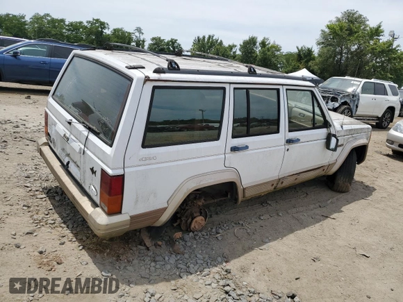1993 Jeep Cherokee Country with VIN 1J4FJ78S6PL504836, listed as a Copart auction lot 59434224 with 150,581 mi miles and Non Repairable. Bid and sale history available at carsss.com. Image 3.