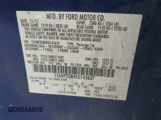 2014 Ford Taurus SE z VIN 1FAHP2D84EG145637, wystawiony jako IAAI lot #42393128 z przebiegiem 264 149 mil mil oraz . Historia ofert i sprzedaży dostępna na DreamBid. Obrazek 9.
