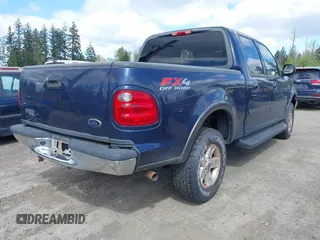 2003 Ford F-150 XLT with VIN 1FTRW08L93KD64270, listed as a IAAI auction lot 42088905 with 181,528 mi miles. Bid and sale history available at carsss.com. Image 4.