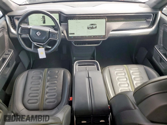 2025 Rivian R1S Adventure z VIN 7PDSGBBA3SN046975, wystawiony jako Copart lot #61790405 z przebiegiem 8 427 mil mil oraz Szkoda całkowita • Salvage title. Historia ofert i sprzedaży dostępna na DreamBid. Obrazek 8.