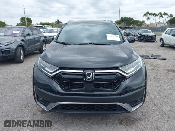 2021 Honda CR-V Touring with VIN 2HKRW1H91MH410751, listed as a IAAI auction lot 41286168 with 56,314 mi miles. Bid and sale history available at carsss.com. Image 12.