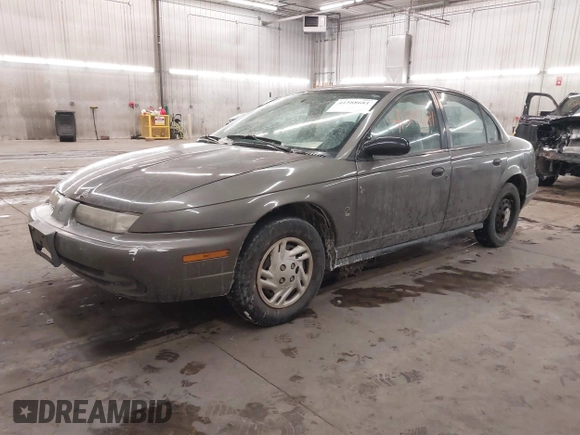1998 Saturn SL z VIN 1G8ZH528XWZ240574, wystawiony jako IAAI lot #41588681 z przebiegiem Nie podano mil oraz . Historia ofert i sprzedaży dostępna na DreamBid. Obrazek 2.