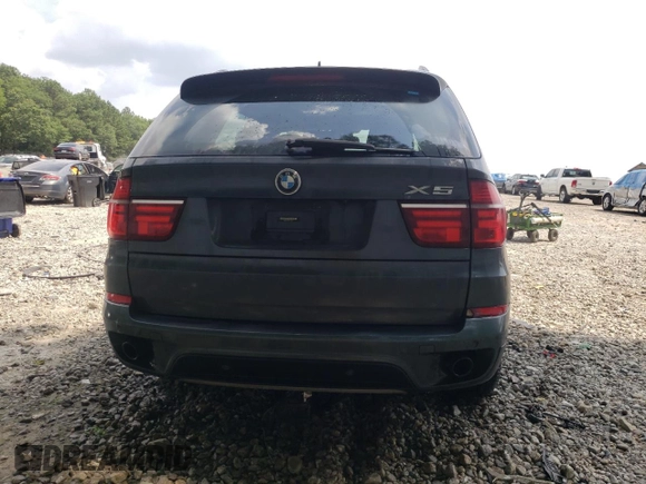 2012 BMW X5 35i z VIN 5UXZV4C55CL753810, wystawiony jako Copart lot #62405565 z przebiegiem 178 504 mil mil oraz Szkoda całkowita • Salvage title. Historia ofert i sprzedaży dostępna na DreamBid. Obrazek 6.