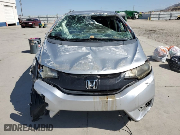 2016 Honda Fit LX with VIN JHMGK5H5XGX020620, listed as a Copart auction lot 60337295 with 103,827 mi miles and Salvage title. Bid and sale history available at DreamBid. Image 5.
