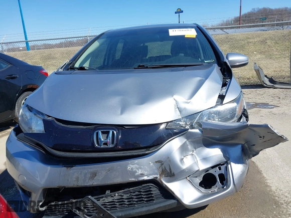2017 Honda Fit LX with VIN JHMGK5H59HS011308, listed as a IAAI auction lot 41766682 with 88,582 mi miles. Bid and sale history available at carsss.com. Image 13.
