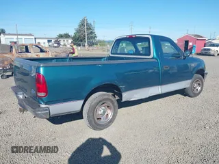 1997 Ford F-150 with VIN 1FTDF1724VKC15406, listed as a IAAI auction lot 42336536 with 190,569 mi miles and . Bid and sale history available at DreamBid. Image 4.