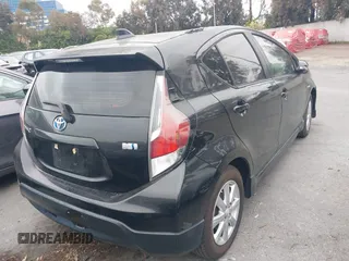 2017 Toyota Prius One with VIN JTDKDTB32H1597017, listed as a IAAI auction lot 42030182 with 56,461 mi miles and . Bid and sale history available at carsss.com. Image 4.