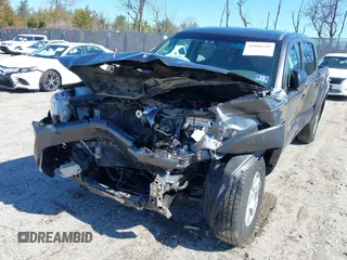 2015 Toyota Tacoma with VIN 3TMLU4EN0FM194841, listed as a IAAI auction lot 41860349 with 200,005 mi miles and . Bid and sale history available at DreamBid. Image 6.