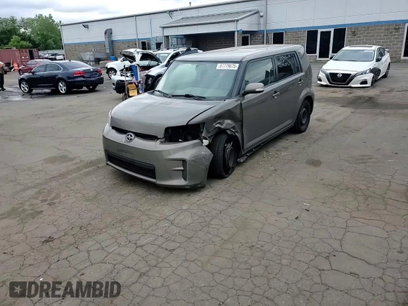 2012 Scion xB z VIN JTLZE4FE1CJ014494, wystawiony jako Copart lot #57779675 z przebiegiem 151 857 mil mil oraz Szkody całkowita. Historia ofert i sprzedaży dostępna na DreamBid. Obrazek 14.