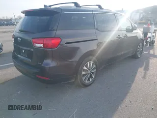 2016 Kia Sedona EX with VIN KNDMC5C1XG6159271, listed as a IAAI auction lot 41409277 with 95,696 mi miles. Bid and sale history available at carsss.com. Image 4.