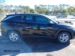 2022 Hyundai Tucson SE with VIN 5NMJA3AE2NH079952, listed as a IAAI auction lot 40908823 with 8,203 mi miles and . Bid and sale history available at carsss.com. Image 13.