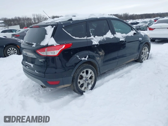 2016 Ford Escape Titanium with VIN 1FMCU9J96GUC08563, listed as a IAAI auction lot 41252475 with 120,404 mi miles. Bid and sale history available at carsss.com. Image 4.
