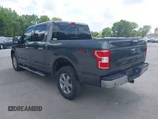 2018 Ford F-150 XL with VIN 1FTEW1E57JFA95086, listed as a IAAI auction lot 42574704 with 77,301 mi miles and . Bid and sale history available at DreamBid. Image 3.