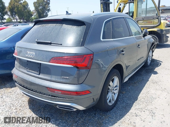 2022 Audi Q5 S line Premium z VIN WA1GAAFY3N2088773, wystawiony jako IAAI lot #41969990 z przebiegiem 22 922 mil mil oraz . Historia ofert i sprzedaży dostępna na DreamBid. Obrazek 4.