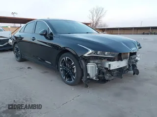 2022 Kia K5 GT-Line z VIN 5XXG64J2XNG104053, wystawiony jako IAAI lot #41804247 z przebiegiem 66 738 mil mil oraz . Historia ofert i sprzedaży dostępna na DreamBid. Obrazek 1.