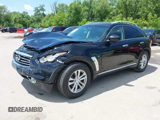 2015 Infiniti QX70 with VIN JN8CS1MW1FM482625, listed as a IAAI auction lot 42332365 with 88,912 mi miles and . Bid and sale history available at DreamBid. Image 2.