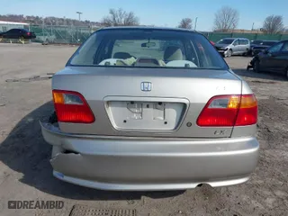 2000 Honda Civic LX with VIN 1HGEJ6679YL066102, listed as a IAAI auction lot 41585270 with 164,714 mi miles. Bid and sale history available at carsss.com. Image 15.