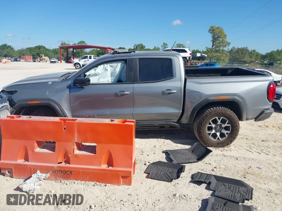2024 GMC Canyon 4WD AT4X with VIN 1GTP6EEK6R1250127, listed as a IAAI auction lot 41823196 with 1,574 mi miles and . Bid and sale history available at carsss.com. Image 14.