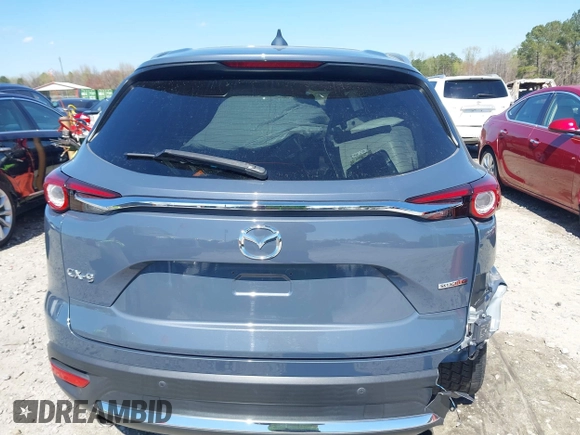 2021 Mazda CX-9 Carbon Edition with VIN JM3TCADY9M0517174, listed as a IAAI auction lot 41871485 with 48,484 mi miles and . Bid and sale history available at DreamBid. Image 17.