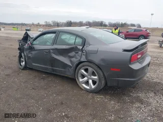 2014 Dodge Charger RT Plus with VIN 2C3CDXCT6EH159466, listed as a IAAI auction lot 41717142 with 104,462 mi miles. Bid and sale history available at carsss.com. Image 3.