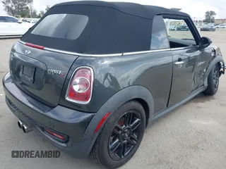 2012 MINI Convertible S with VIN WMWZP3C54CT250689, listed as a IAAI auction lot 41928624 with 126,442 mi miles and . Bid and sale history available at DreamBid. Image 4.