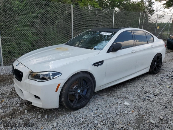 2015 BMW M5 with VIN WBSFV9C5XFD595229, listed as a Copart auction lot 63020514 with 0 mi miles and Salvage Title. Bid and sale history available at carsss.com. Image 1.