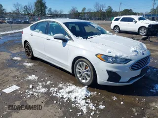 2020 Ford Fusion Hybrid SE with VIN 3FA6P0LU9LR173403, listed as a IAAI auction lot 41596304 with 106,111 mi miles. Bid and sale history available at carsss.com. Image 1.