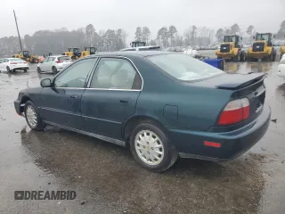 1996 Honda Accord EX with VIN 1HGCD5656TA174575, listed as a Copart auction lot 86435334 with 217,784 mi miles and Salvage Title. Bid and sale history available at DreamBid. Image 2.