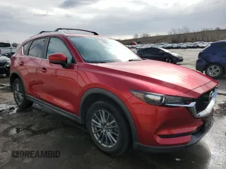 2017 Mazda CX-5 Touring with VIN JM3KFBCL2H0130289, listed as a Copart auction lot 51287885 with 70,170 mi miles and Salvage Title. Bid and sale history available at carsss.com. Image 4.
